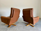 1970’s Danish Caramel Cowboy Leather and Beech Swivel Lounge Chair Pair