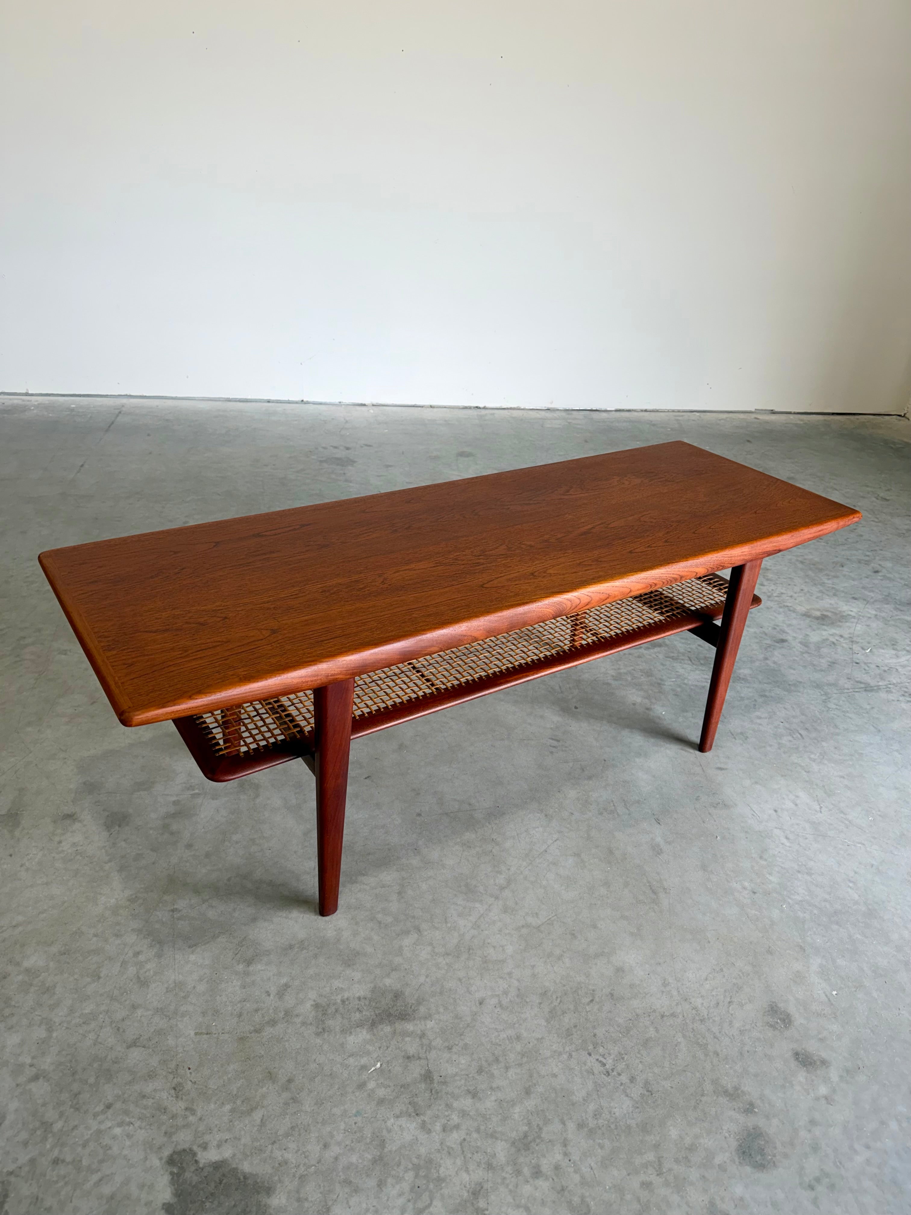 Mid Century Danish Teak and Cane Coffee Table with Magazine Rack