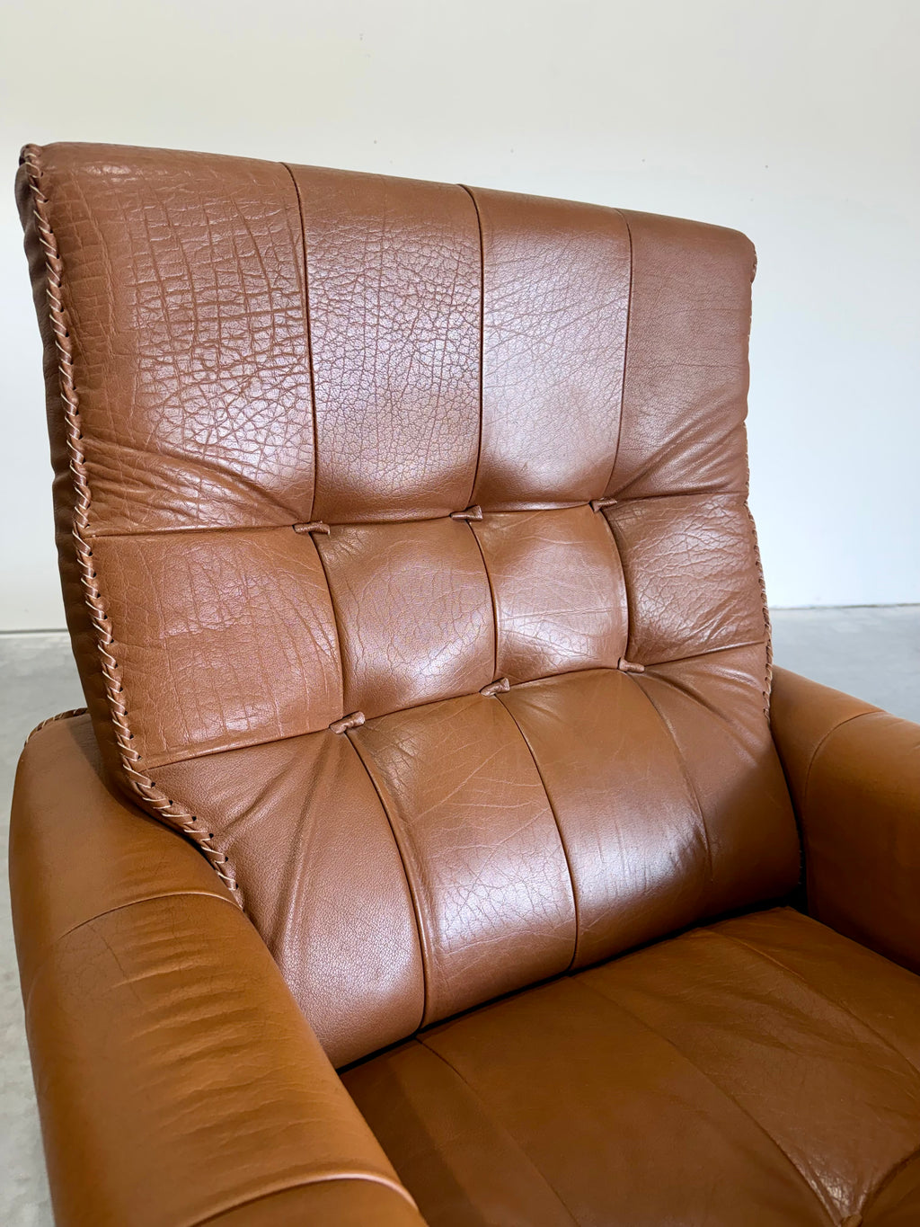 1970’s Danish Caramel Cowboy Leather and Beech Swivel Lounge Chair Pair