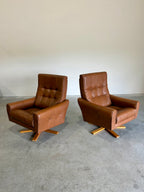 1970’s Danish Caramel Cowboy Leather and Beech Swivel Lounge Chair Pair