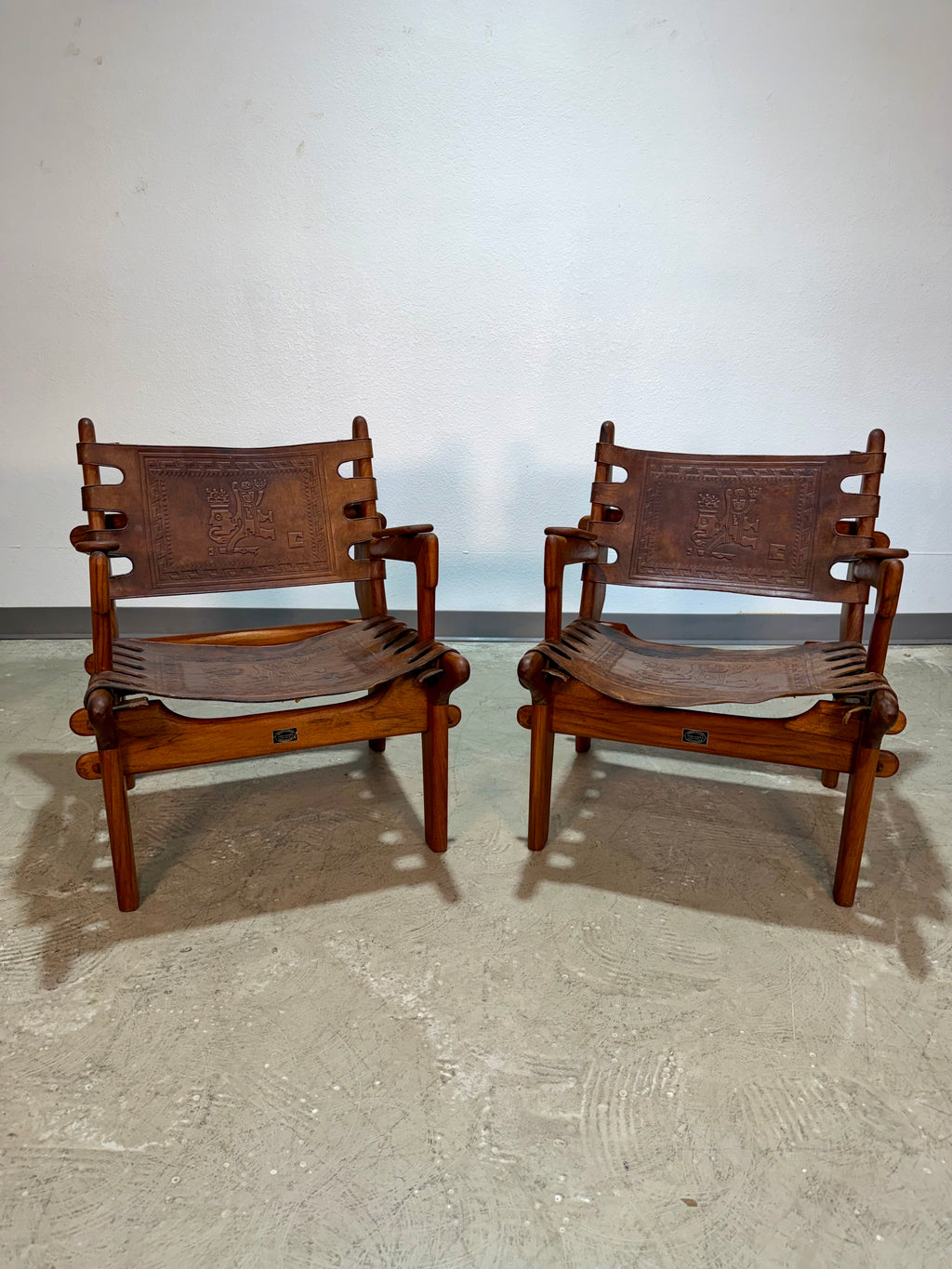Pair of Mid Century Hand Tooled Leather Angel Pazmino Safari Lounge Chairs