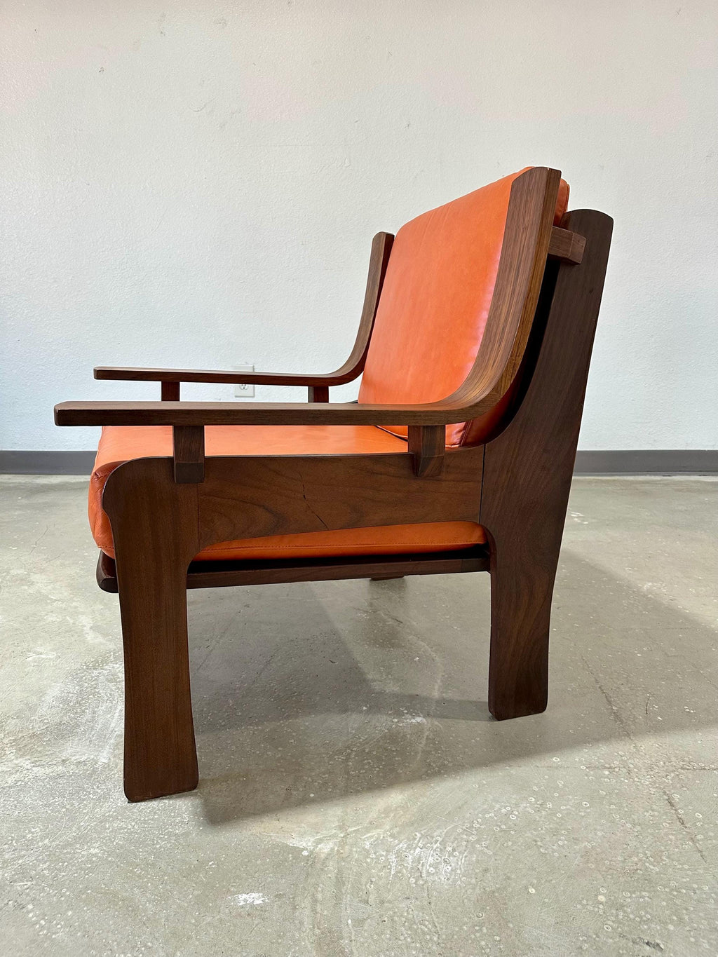 Italian Mid Century Rosewood and Leather Lounge Chair
